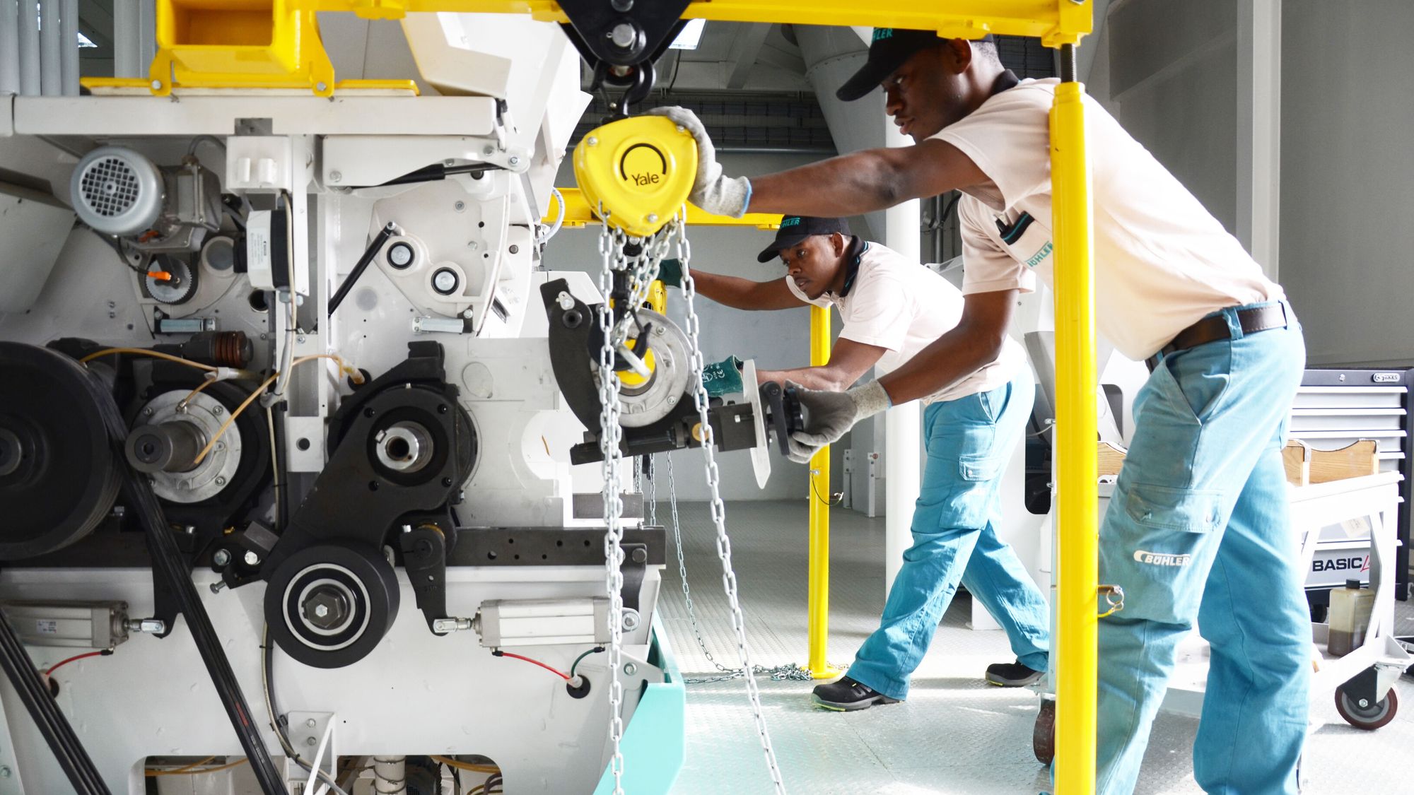 A service tech inspects a roll