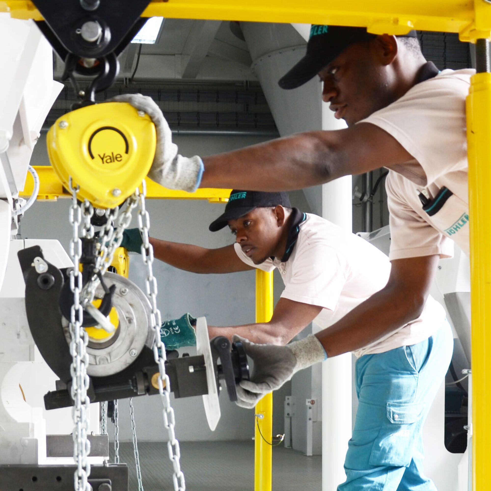 A service tech inspects a roll