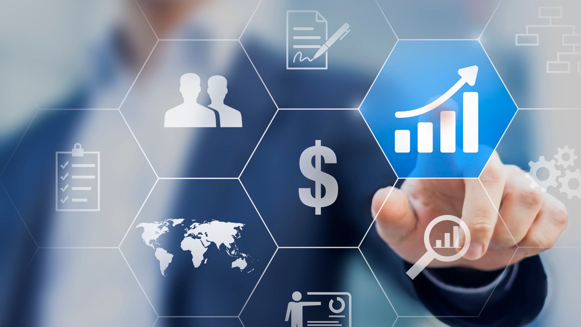 Businessman touching buttons with solutions to increase profit and get success iStock-588372286.jpg
