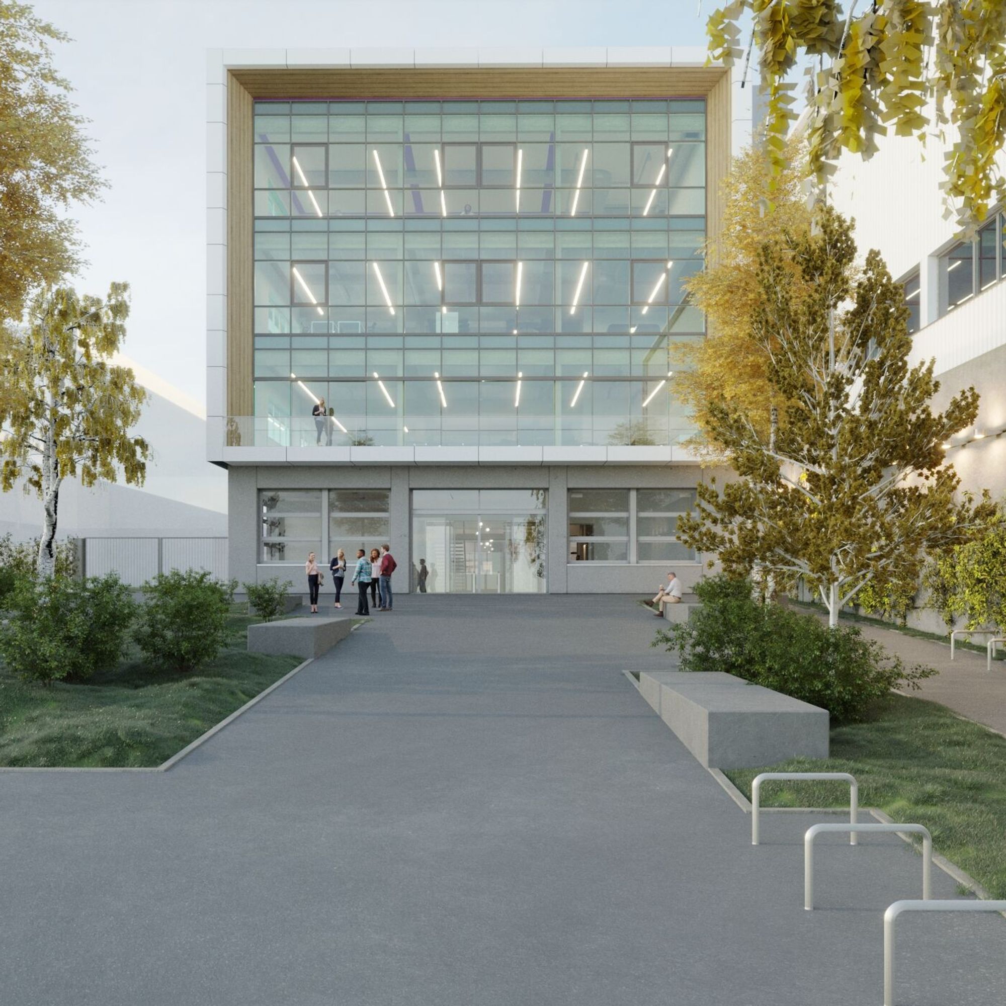 Das Gebäude öffnet sich dank seines eigenen Zugangs nach aussen. Es soll auch für externe Partner einfach zugänglich sein (Bild: Uze AG).