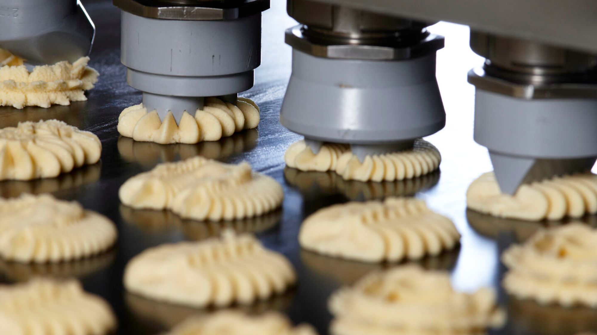 Biscuit wire cutter and depositor in Bühler Denmark's Biscuit Innovation Center